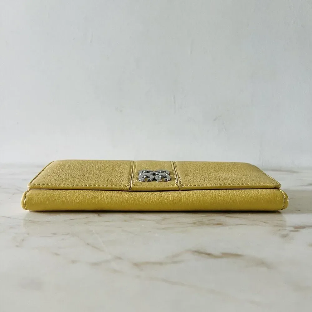 COACH Julie Sunflower Yellow Leather Slim Envelope Bifold Continental Wallet